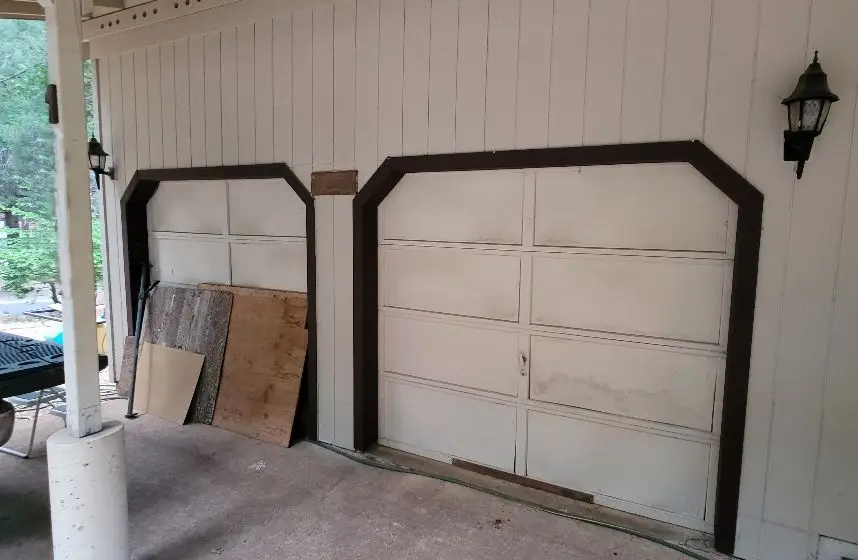 Mr. Goldie Garage Door - A Mr. Goldie Garage Doors professional performing Marysville garage door repair to fix a stuck residential door.
